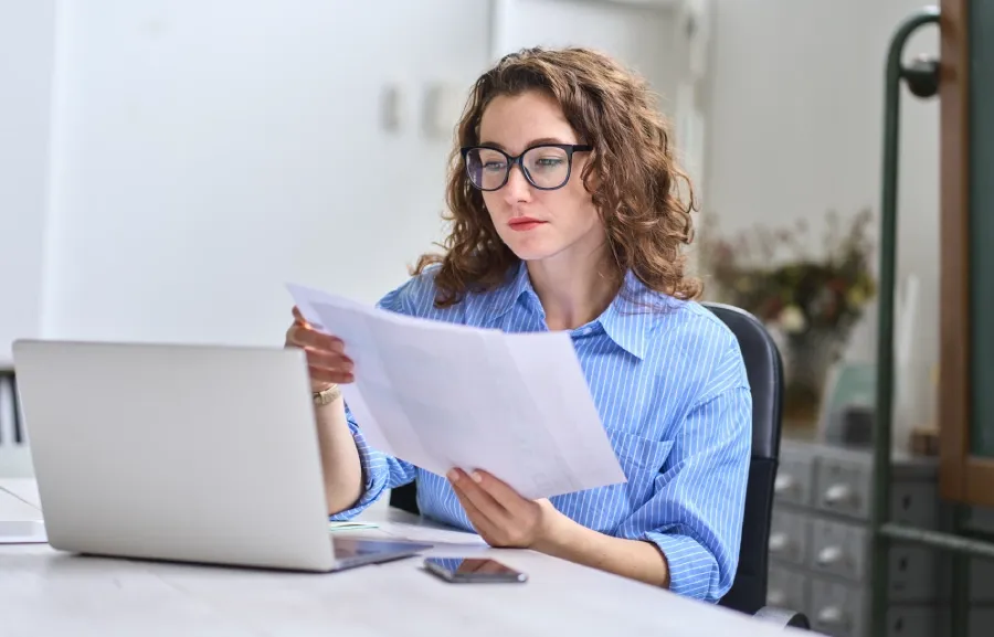 Busy woman doing payroll